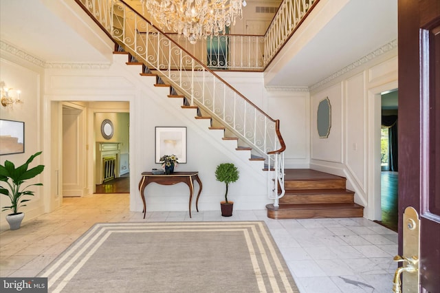 entryway with a notable chandelier