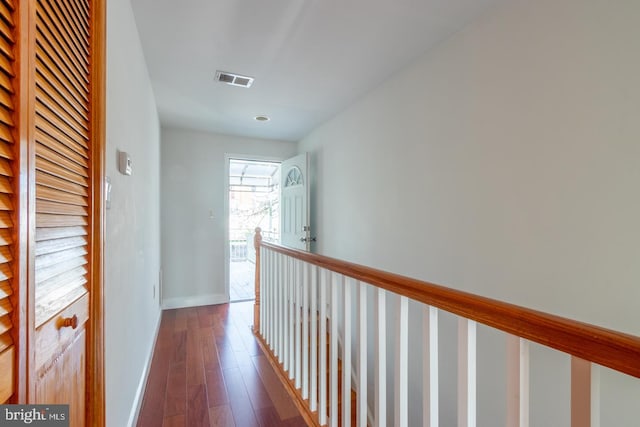 hallway featuring dark wood-type flooring