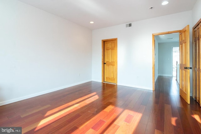 interior space with dark hardwood / wood-style floors