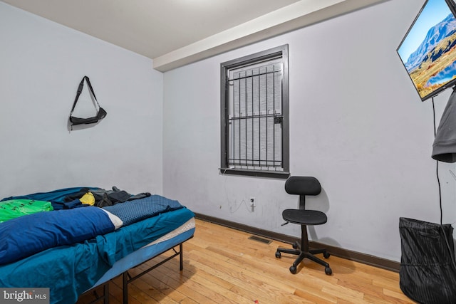 bedroom featuring light hardwood / wood-style floors