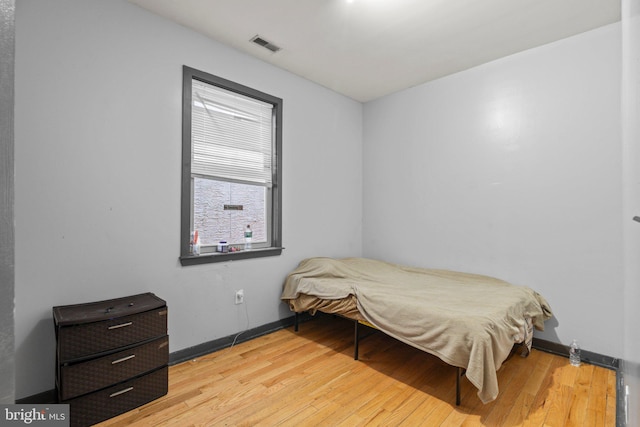 bedroom featuring light hardwood / wood-style floors