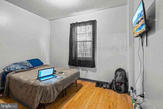 bedroom with light wood-type flooring