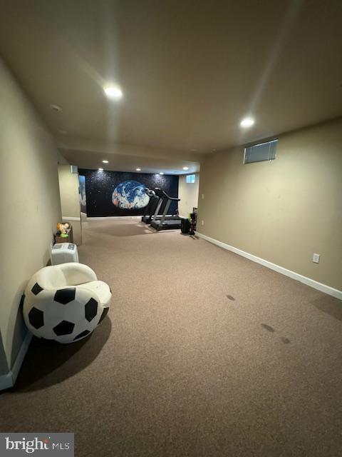 cinema room featuring carpet floors, baseboards, and recessed lighting