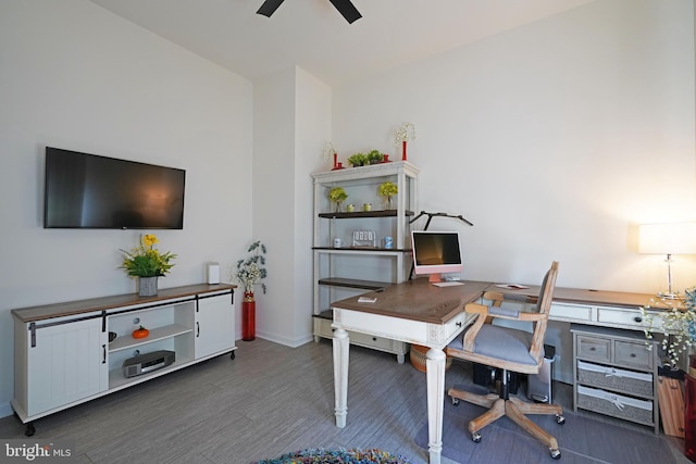 office space with dark hardwood / wood-style flooring and ceiling fan