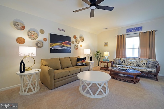 living room with light colored carpet and ceiling fan