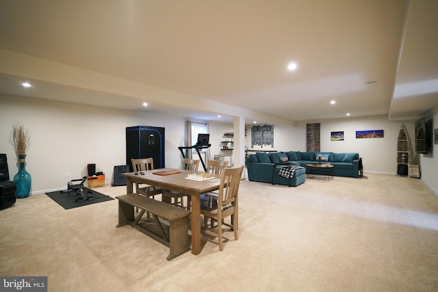 view of carpeted dining area