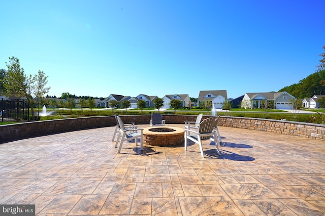 view of patio / terrace featuring a fire pit