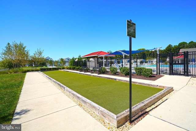 view of home's community with a swimming pool