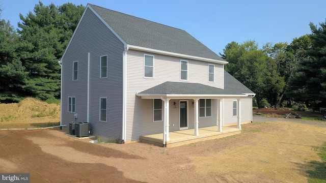 view of front of home with central AC unit and covered porch