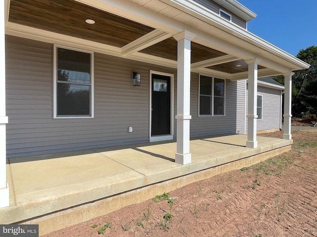 entrance to property with covered porch