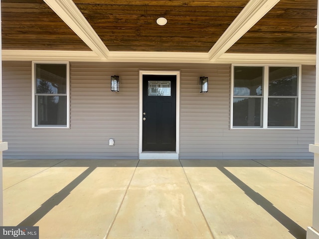 doorway to property featuring a porch