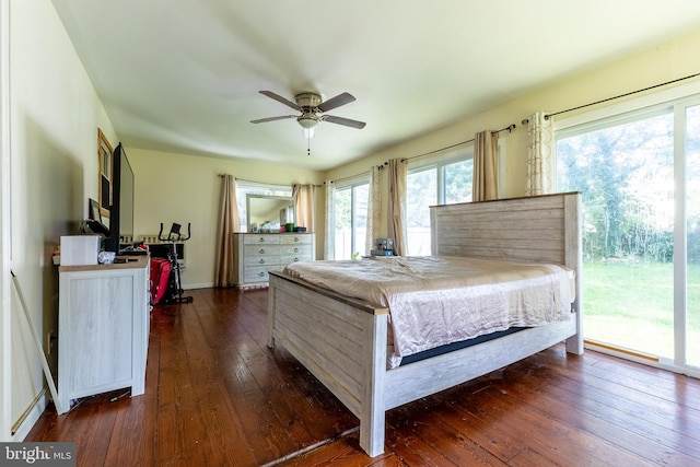 bedroom with ceiling fan, access to exterior, and dark hardwood / wood-style flooring