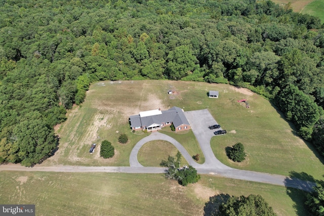 aerial view featuring a view of trees