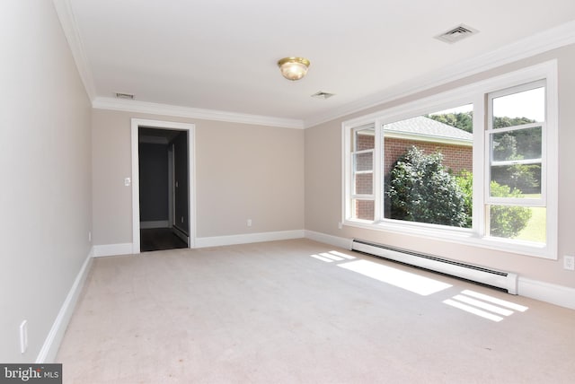 spare room with crown molding, visible vents, carpet floors, and a baseboard radiator