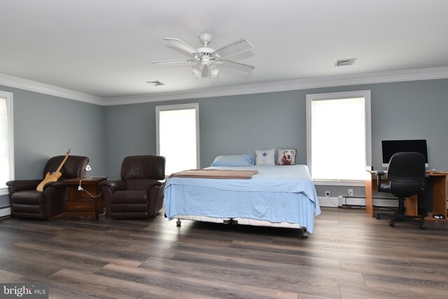 bedroom featuring ornamental molding, dark wood-type flooring, a baseboard radiator, and ceiling fan