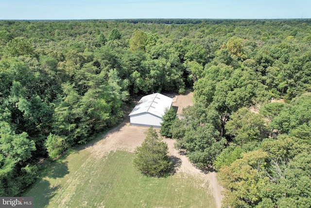 aerial view featuring a view of trees