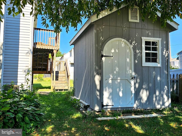 view of shed with stairway