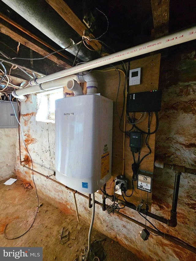 utility room featuring water heater