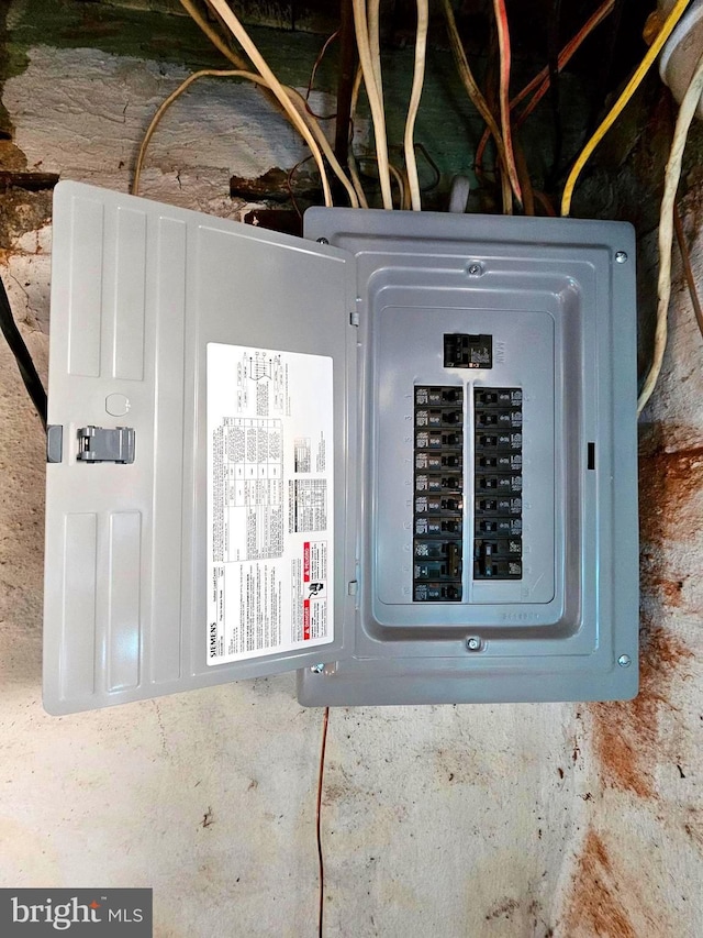 utility room featuring electric panel