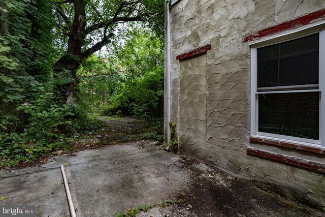 view of home's exterior featuring a patio