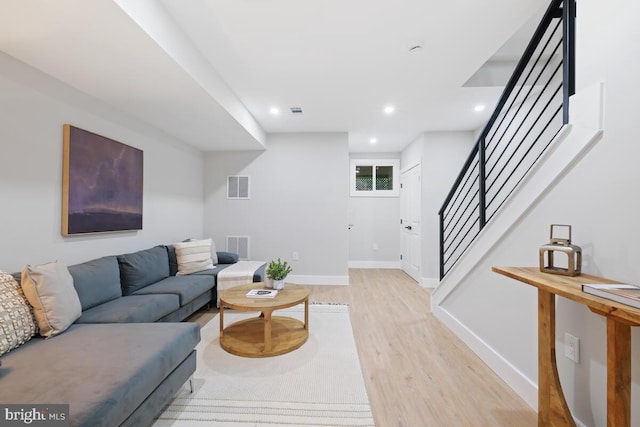 living room featuring light wood-type flooring