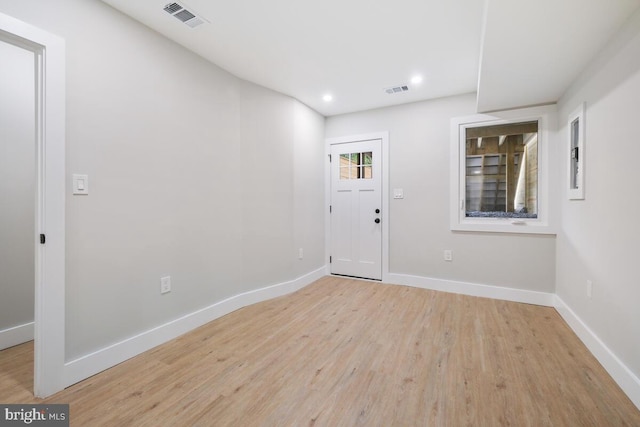 foyer with light hardwood / wood-style flooring