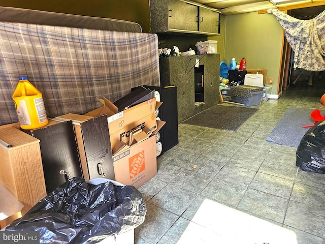 miscellaneous room featuring tile patterned floors