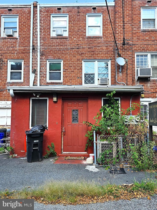 view of front facade with cooling unit