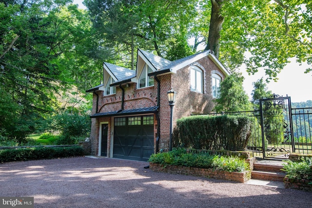 view of side of home featuring a garage