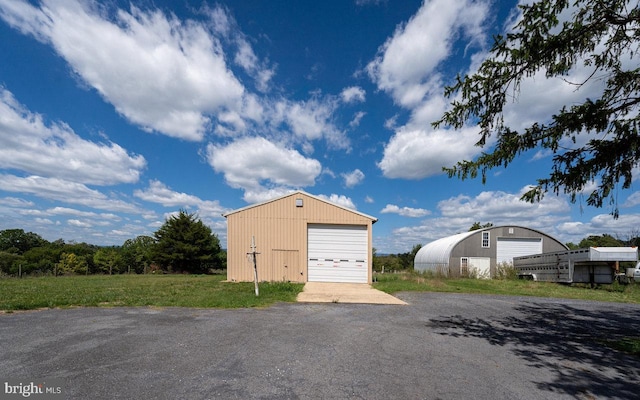 view of outdoor structure with a garage