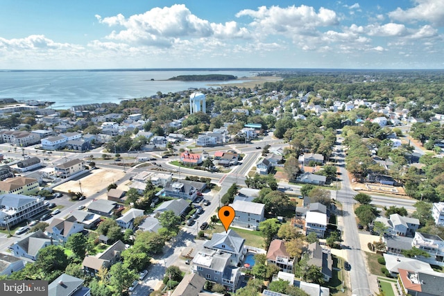 birds eye view of property featuring a residential view and a water view