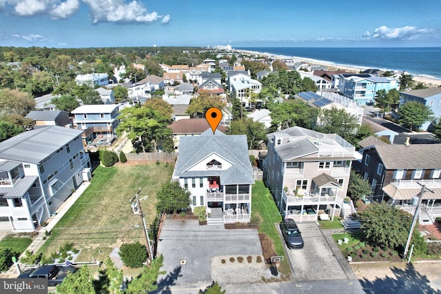 aerial view with a water view and a residential view