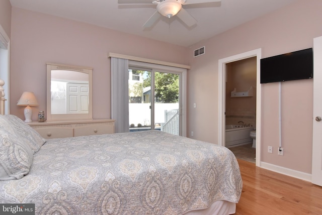 bedroom with access to exterior, visible vents, ensuite bathroom, light wood-style floors, and ceiling fan