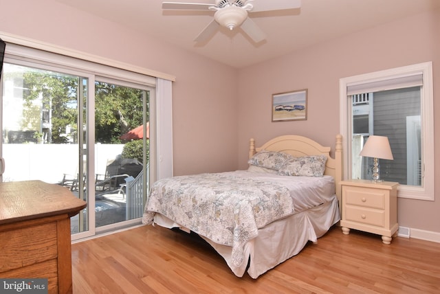 bedroom with access to outside, light wood-type flooring, and ceiling fan