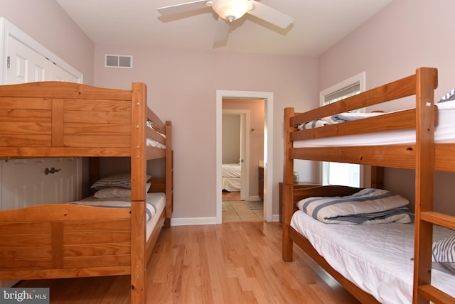 bedroom featuring ceiling fan and light hardwood / wood-style flooring