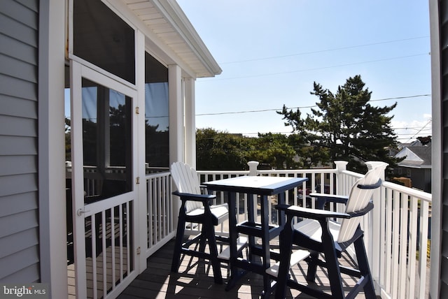 view of wooden balcony with a wooden deck