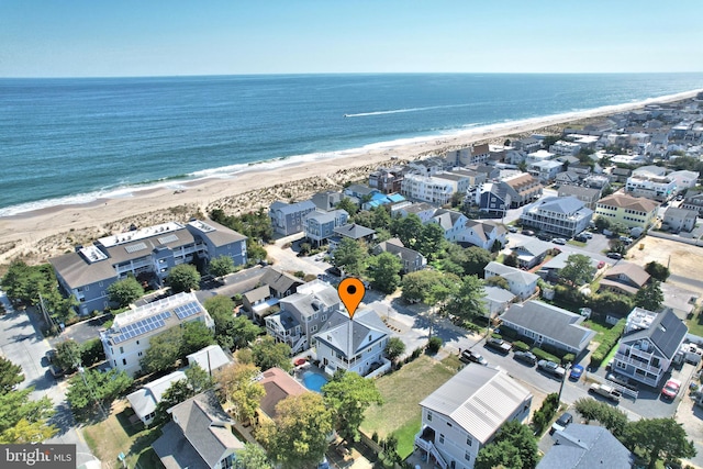 aerial view with a view of the beach and a water view