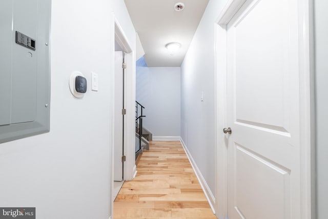 hall with light hardwood / wood-style flooring