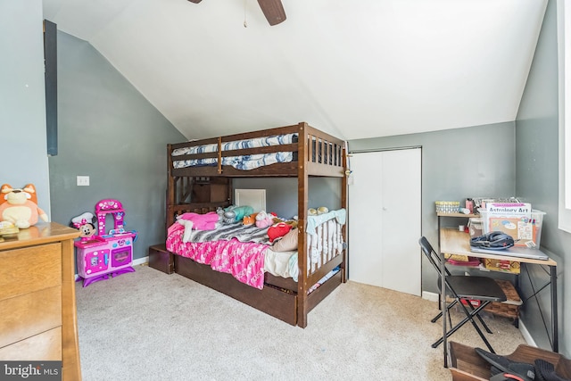 bedroom with a closet, lofted ceiling, ceiling fan, and carpet