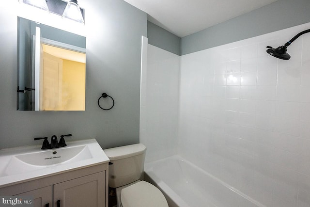 full bathroom with vanity, toilet, and shower / washtub combination