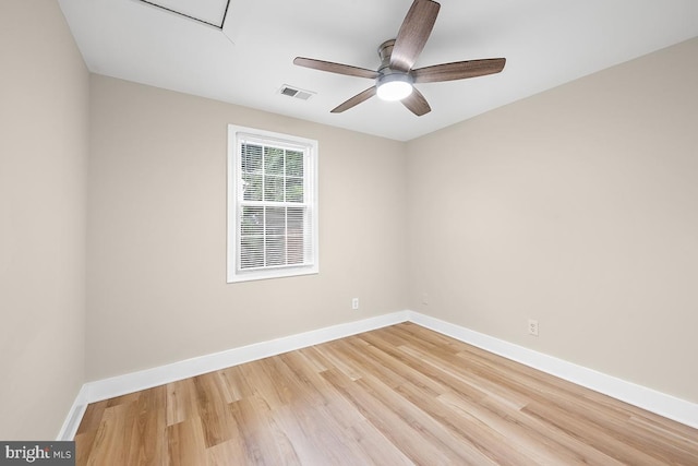 spare room featuring ceiling fan and wood-type flooring