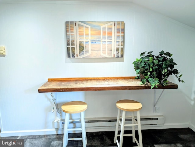 carpeted dining room featuring lofted ceiling, ornamental molding, and baseboard heating