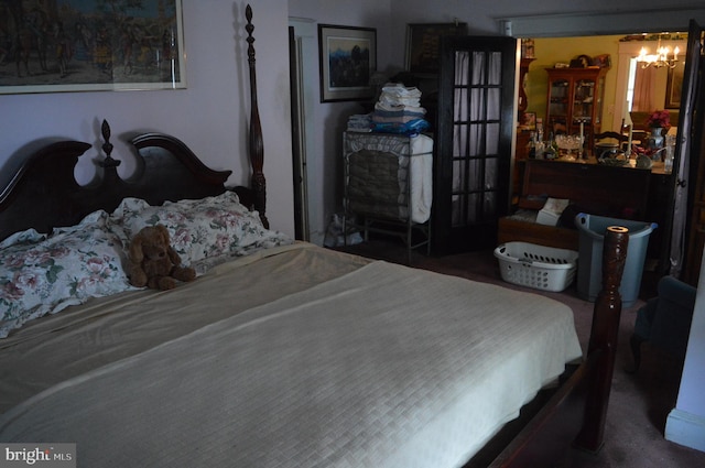 bedroom with a chandelier