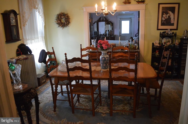 dining room featuring a chandelier