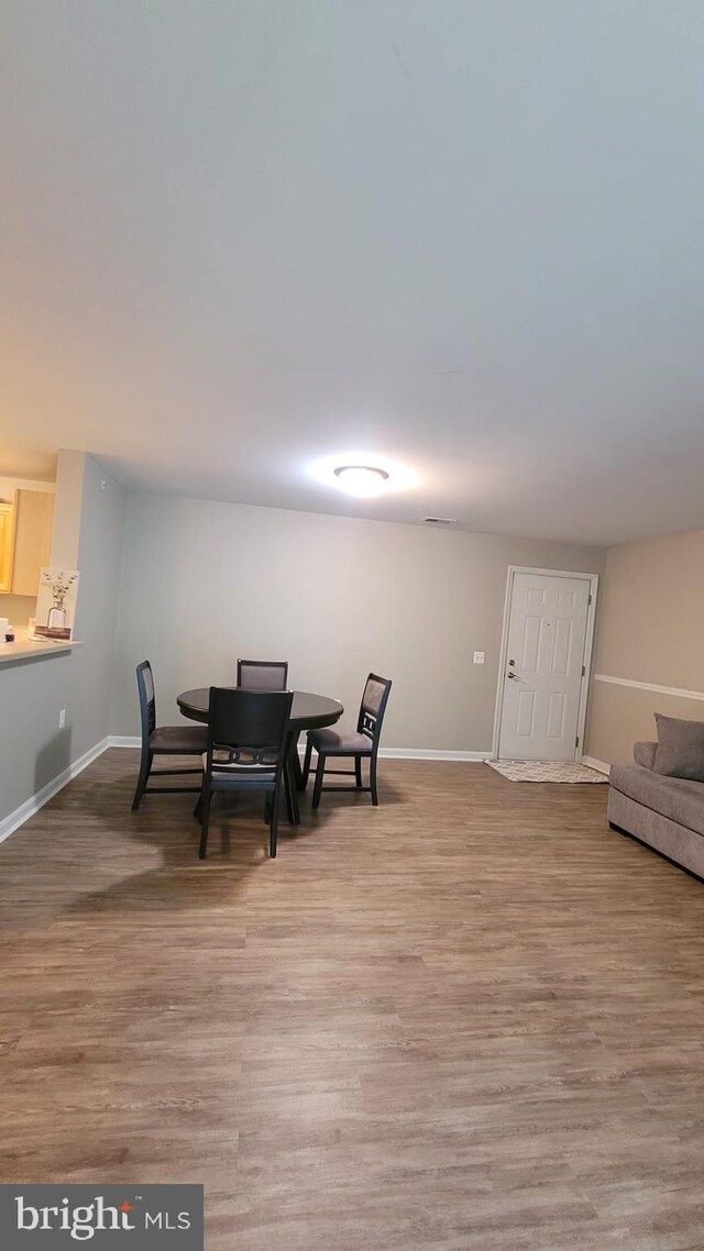 sitting room with light hardwood / wood-style flooring