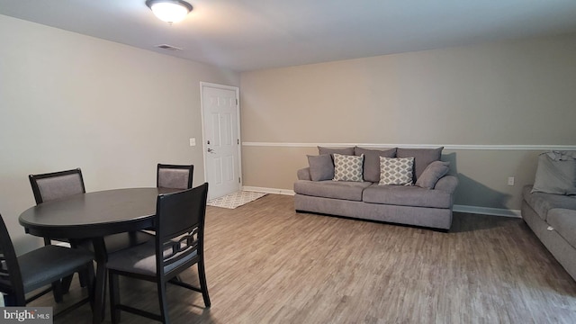 interior space with hardwood / wood-style flooring