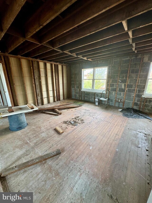 miscellaneous room featuring wood-type flooring