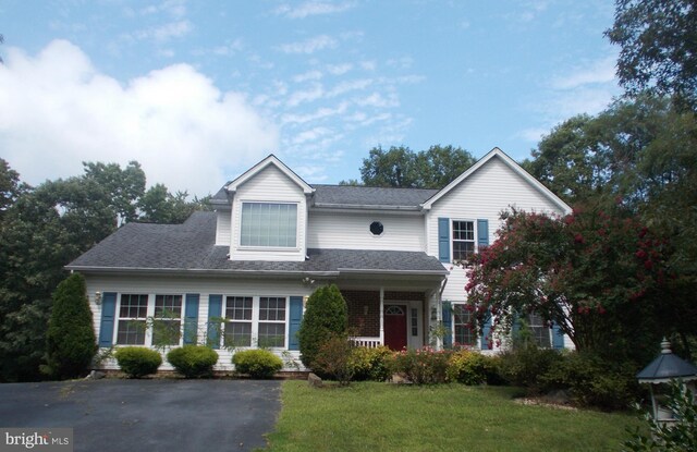 view of front of home with a front yard