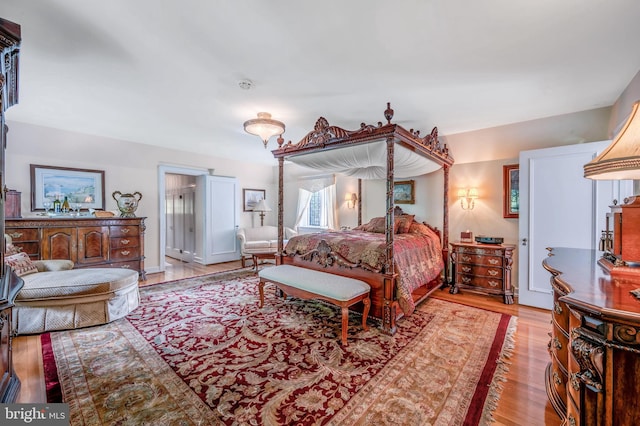 bedroom featuring wood finished floors