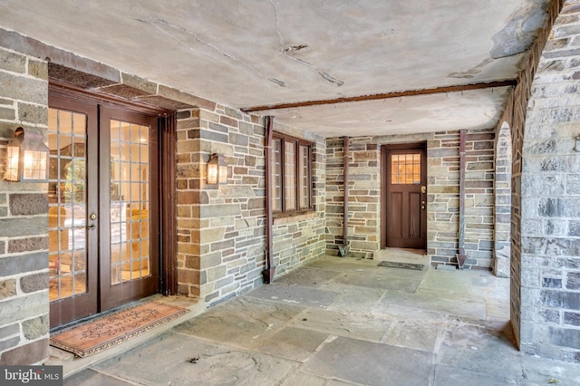 entrance to property featuring french doors